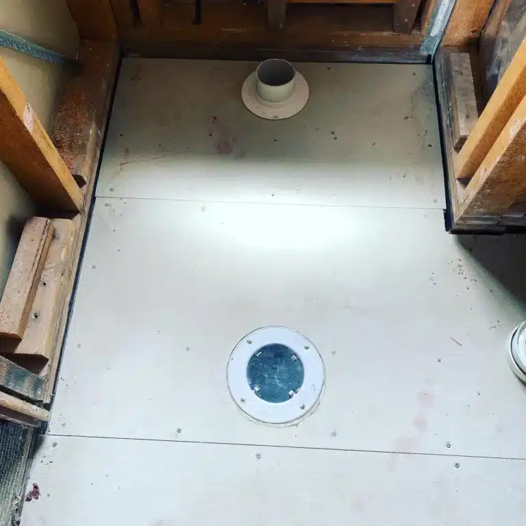 Renovated flooring after plumbing work