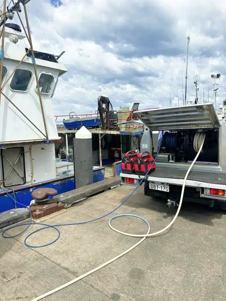 Local plumbers working on the marina