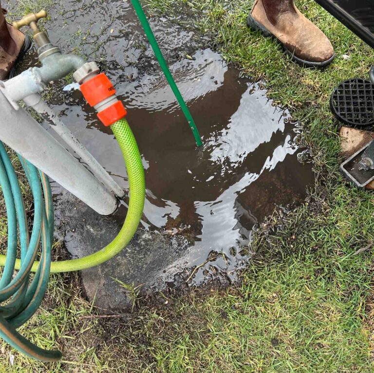A blocked drain needing urgent repairs