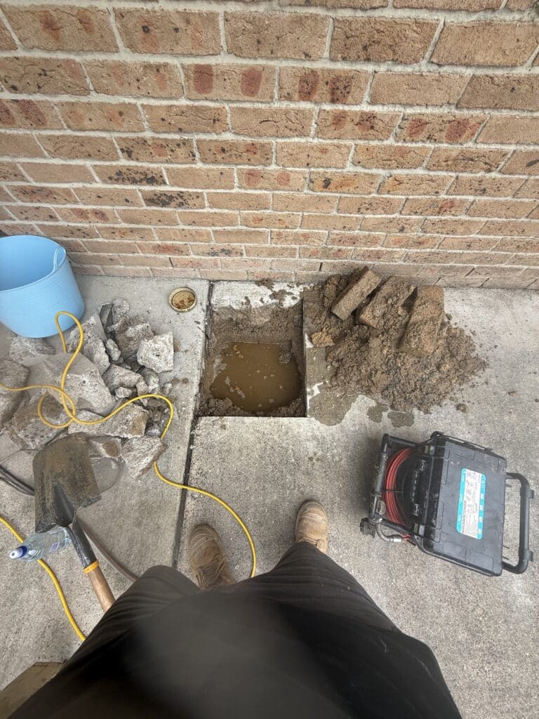 Water pooling because of a blocked drain