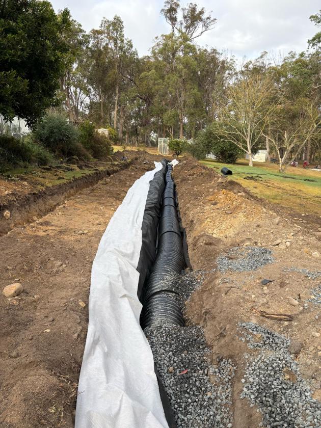 New septic soakage trench under construction on a rural Bega Valley property