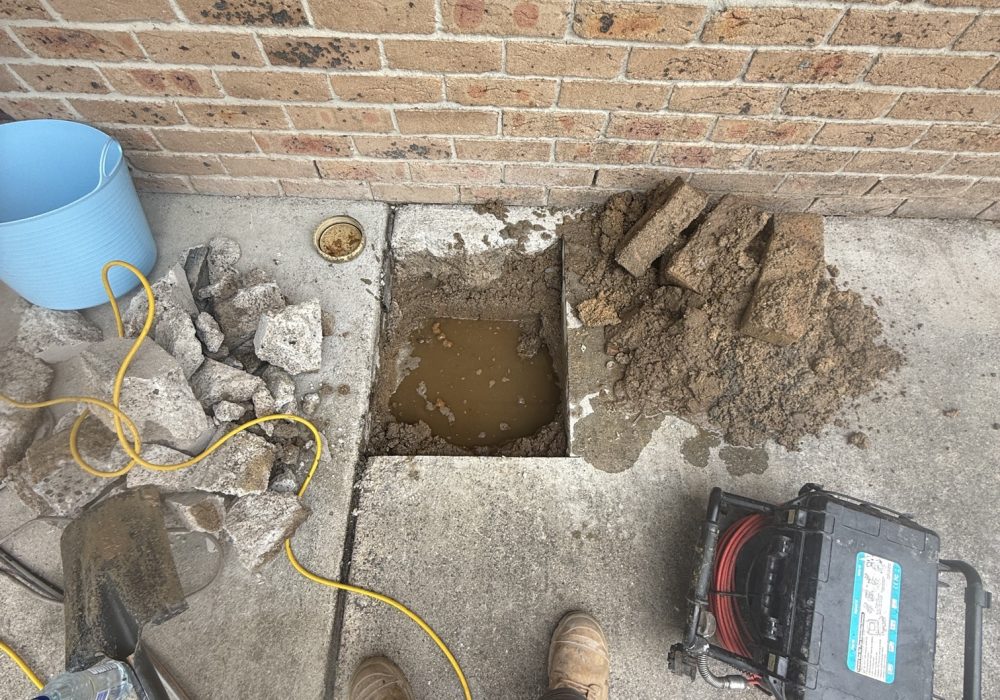 Water pooling because of a blocked drain